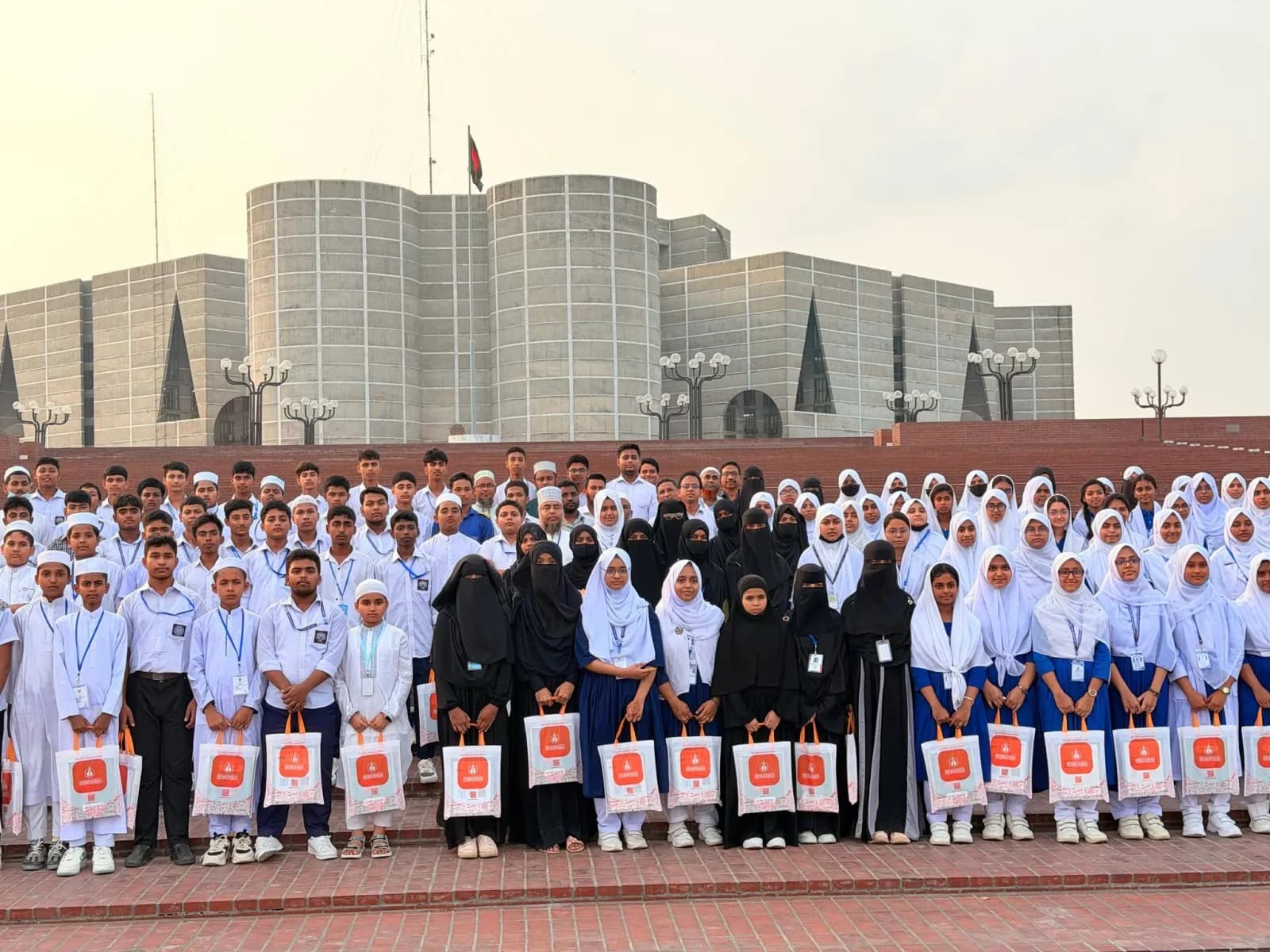 Students gathered before the National Parliament building in Dhaka